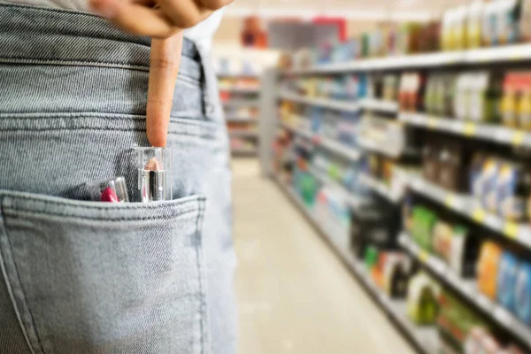 Woman Stealing Lipstick Retail Store Shoplifting Theft Crime — Stock Photo, Image