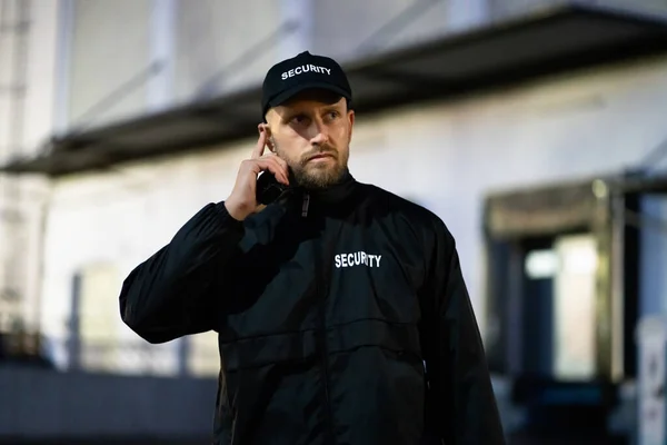 Security Guard Standing Front Building Night — Stock Photo, Image