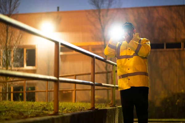 Security Guard Walking Outdoors Flashlight Night — Fotografia de Stock