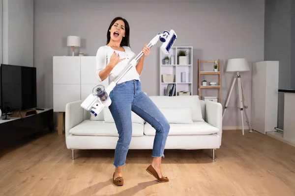 Happy Female Dancing Having Fun Vacuum Cleaner Home — Fotografia de Stock