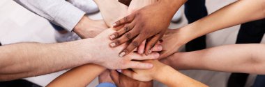 Diverse Multicultural Hand Stack In Circle. Multiracial Cohesive Supporting Hands clipart