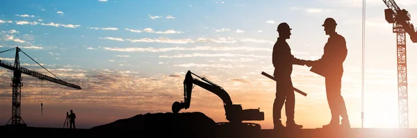 Silhouette Two Male Architect Shaking Hands Construction Site Sunset — Stock Photo, Image