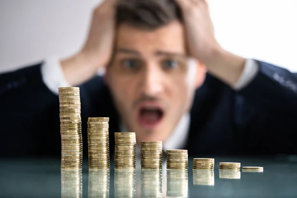 Shocked Businessman Looking Descending Stack Coins — Stock Photo, Image