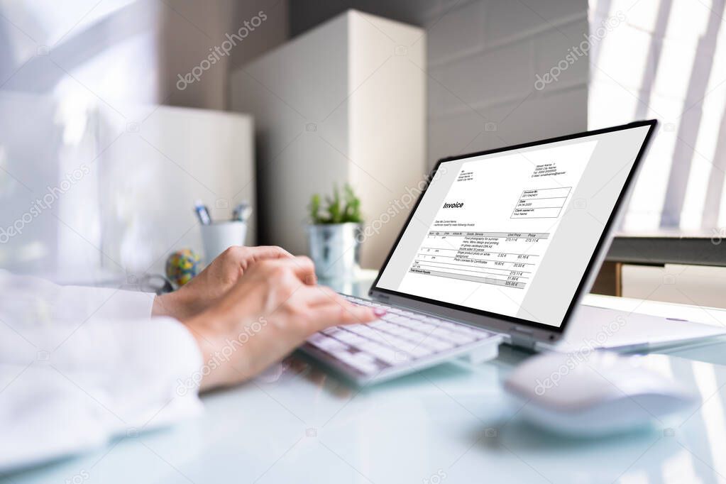 Digital Electronic Bill And Accountant E Invoice On Laptop