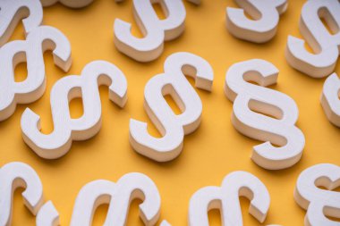 Sarı Arkaplanda Beyaz Paragraf İşaretleri veya Semboller