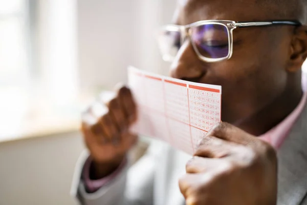 African Man Kissing Gamble Ticket Lotto Game Card — Foto Stock