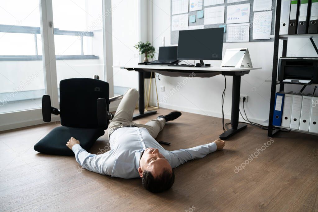 Faint Accident In Office. Fall From Chair At Workplace