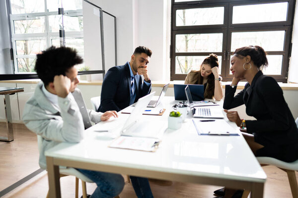 Diverse Bored Meeting Training Presentation In Office