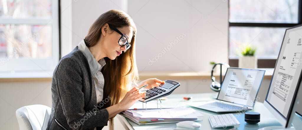 Accountant Or Auditor With Calculator Doing Business Audit