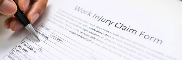 African American Filling Worker Compensation Injury Stock Image