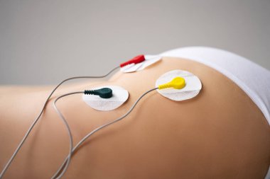 Elektrot Kas Uyarlama Terapisi. Masaj ve Eğitim