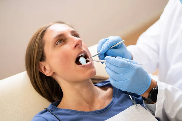 Male Dentist Treating Teeth Young Pregnant Woman Patient Lying Clinic — 스톡 사진