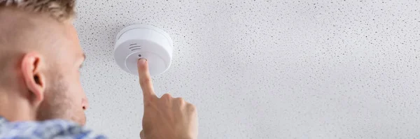 Low Angle View Person Hand Installing Smoke Detector Ceiling Wall — Stock Photo, Image