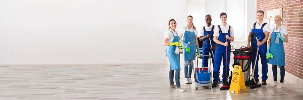 Portrait Happy Diverse Janitors Office Cleaning Equipment — Stock fotografie