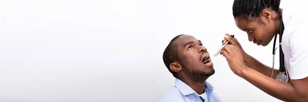 Female Doctor Checking Man Sore Throat Tongue Depressor White Background — Stock Photo, Image