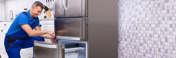 Mature Male Serviceman Repairing Refrigerator Toolbox Kitchen — Stock Photo, Image