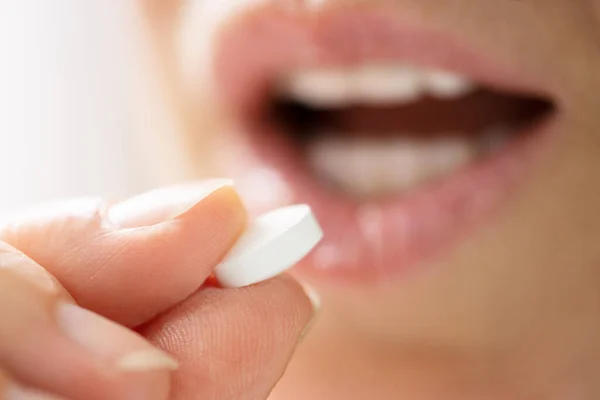 Close Female Hands Putting One White Pill Tongue — Stock Photo, Image