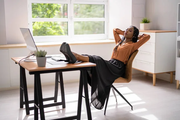 Side View Relaxed Young Businesswoman Sitting Feet Office Desk — Stockfoto