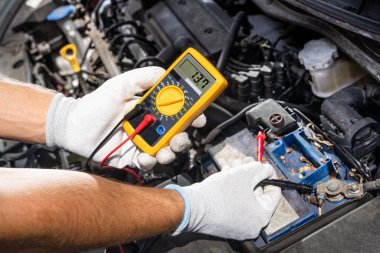 Car Electronic Maintenance Service And Check. Worker Man With Tester Tool