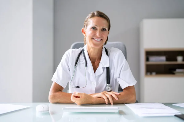 Portrait Happy Female Doctor Stethoscope Desk — Stock Photo, Image