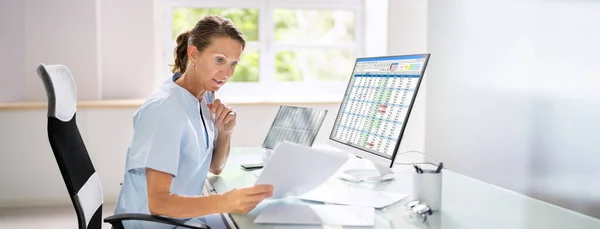 Medical Bill Codes Spreadsheet Data Business Analyst Woman — Stock Photo, Image