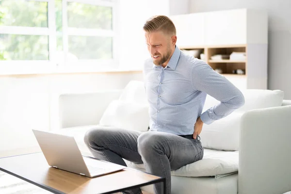 Back Pain Bad Posture Man Sitting Home — Φωτογραφία Αρχείου