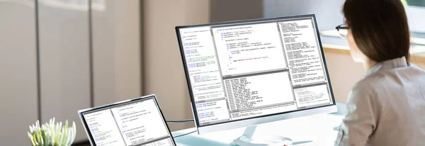 Woman Programmer. Girl Coding Software On Computer