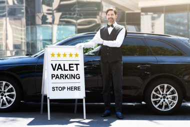 Valet Parking Hotel Service. Man Driver Standing