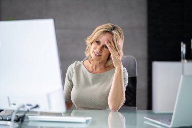 Depressed Tired Lady Using PC Computer. Upset Woman