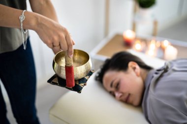 Tibetan Meditation And Relaxation Therapy. Traditional Healing Bowl Care