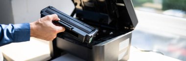 Fixing Toner Printer Or Ink Cartridge Problems. Office Photocopier