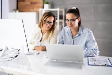 Hybrid Laptop At Workplace In Office. Training On Computer