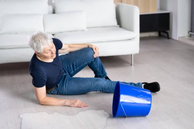 Slip And Fall Accident. Wet Floor Water Spill