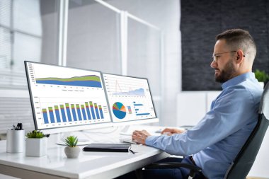 Business Man Analyst Using Data Analytics In Office