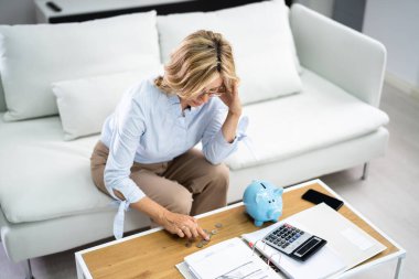 Sad Woman With Finance Problem With Calculator