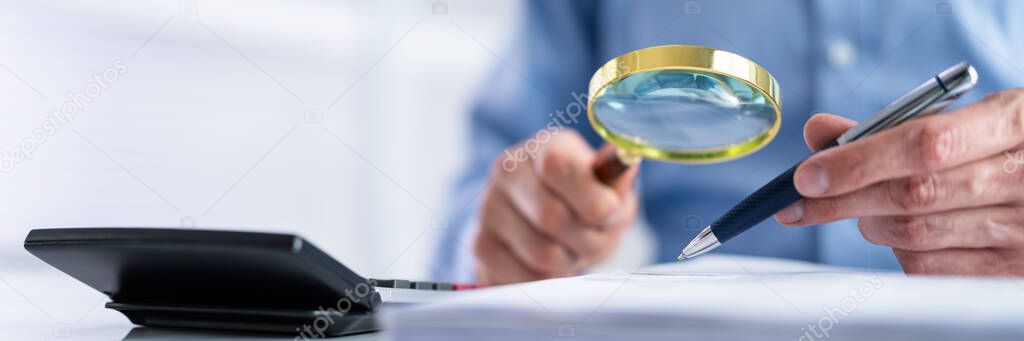 Business Fraud Investigation Using Magnifying Glass. Finance And Tax