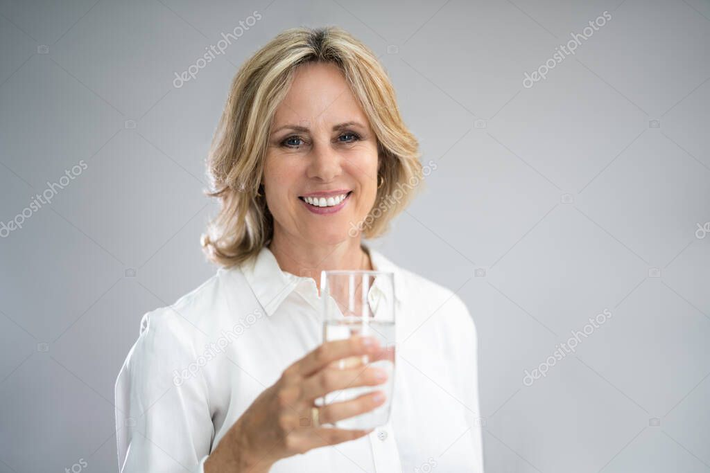 Woman With Senior Cold Water Glass. Body Balance