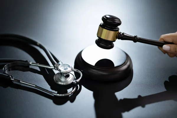Medical Malpractice Gavel And Stethoscope In Courtroom