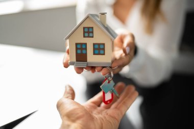 Woman Real Estate Agent Or Broker. House Sale