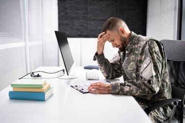 Sad Frustrated Military Veteran Student Doing Test In College