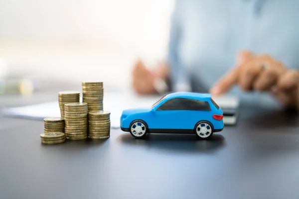 Blue Toy Car Front Businesswoman Calculating Loan — Stock Photo, Image