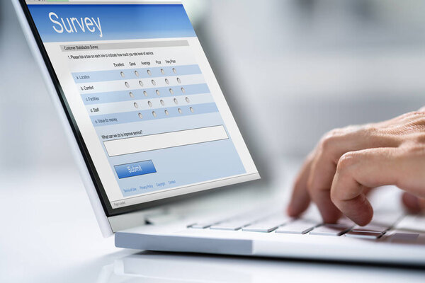 Online Feedback Or Business Survey Form On Computer