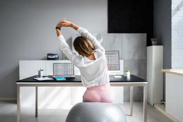 Employee Exercising Ball Office Fitness Health — Zdjęcie stockowe