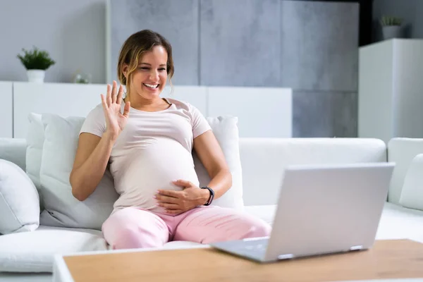 Pregnant Woman Using Online Video Call Doctor Laptop — ストック写真