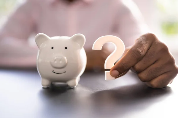 Piggy Bank Question Mark. Money Doubt. Investment Queries