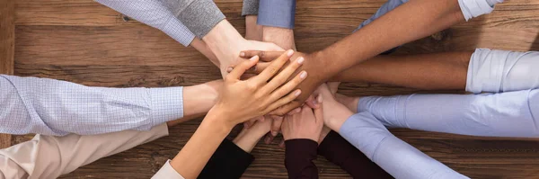 Multiracial Staff Hands Stacking. High Angle View