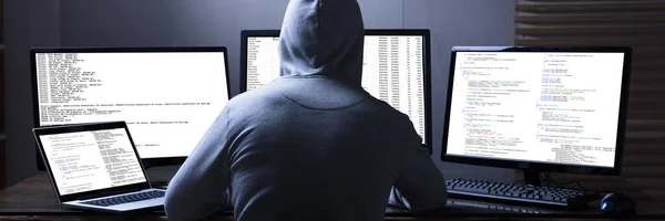 Hacker And Computer Data Breach. Cyber Risk