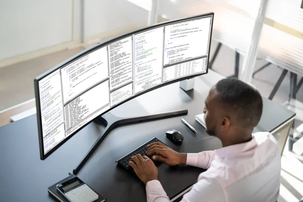 African American Programmer Man Coding On Computer