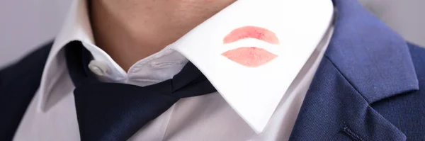 Lipstick Kiss Mark On Man Shirt. Romantic Flirt