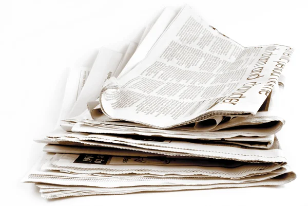 Stack of newspapers isolated — Stock Photo, Image